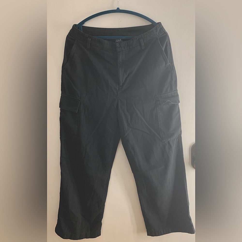 High waisted black flared cargo pants. Woman’s size 10.